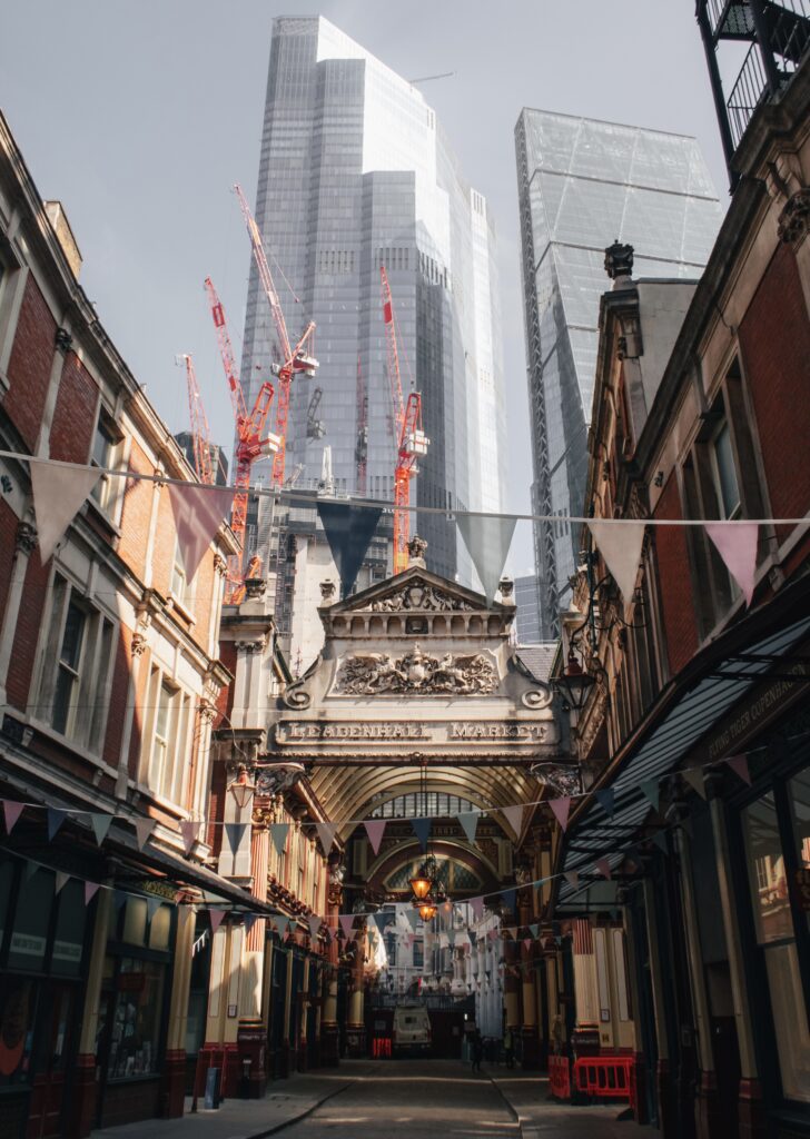The entrance to Leadenhall Market, showing skyscapers in the background
