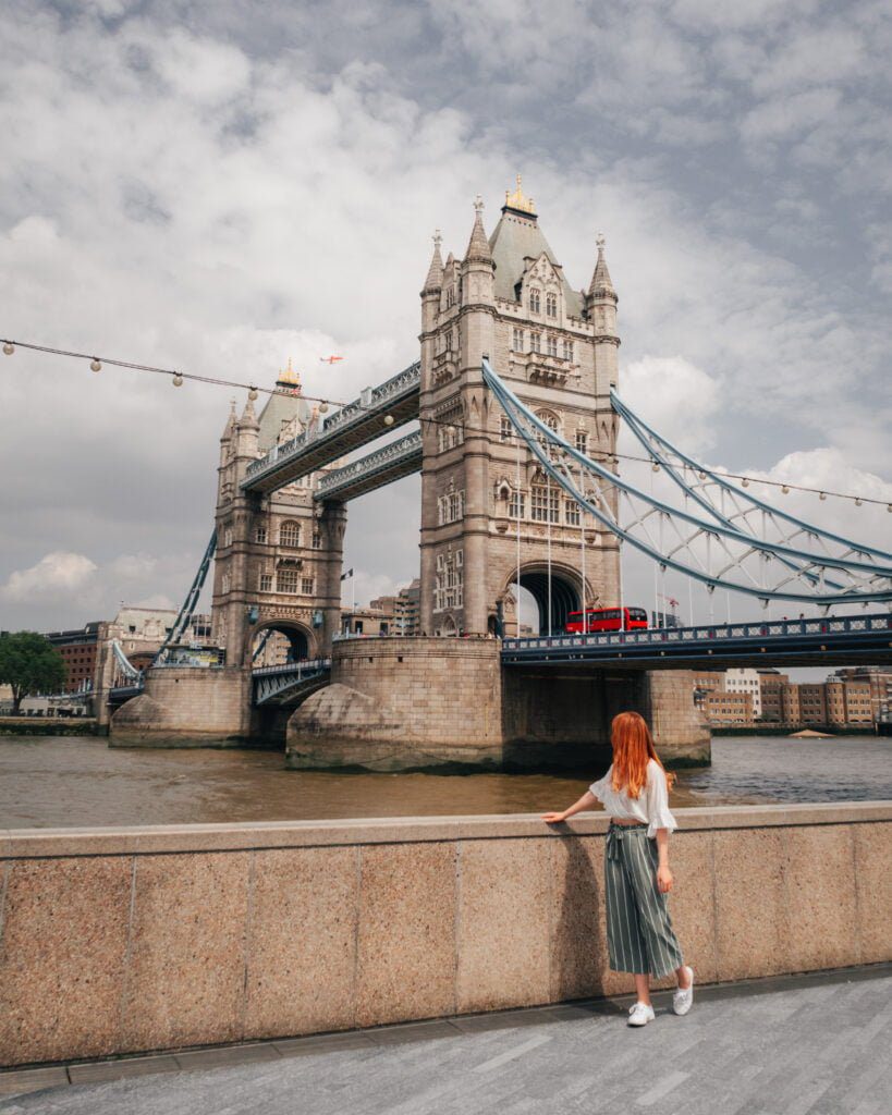 Travel blogger stood infront of Tower Bridge in London
